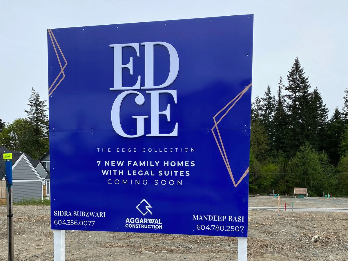 The EDGE Collection coming soon development sign on posts