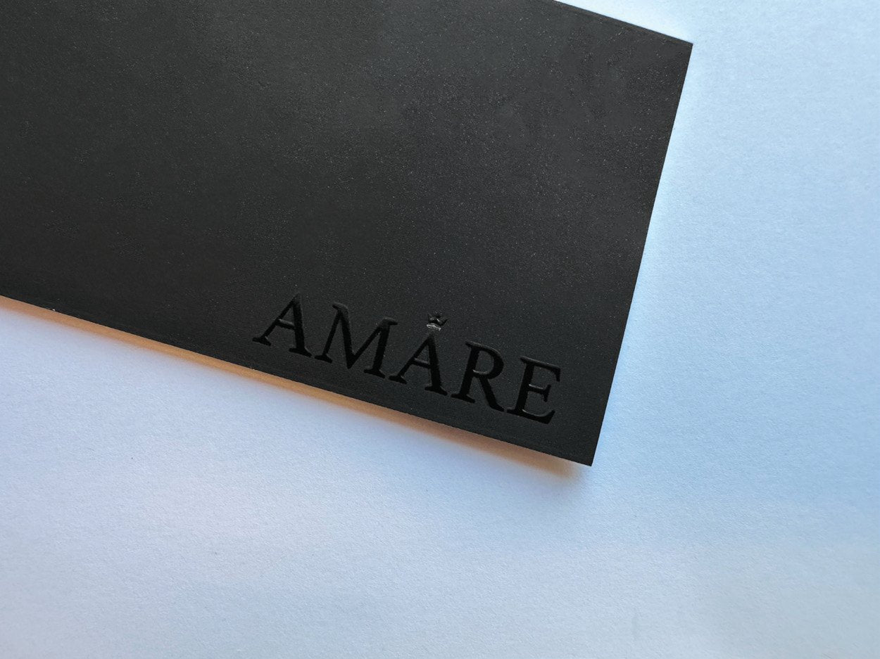 Black business card with spot varnish
